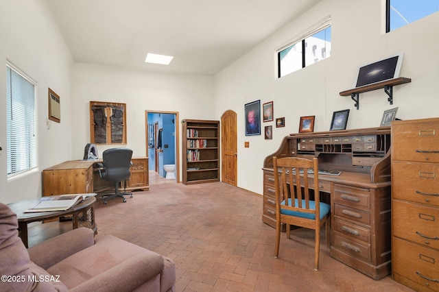 home office with brick floor