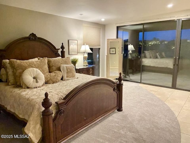 tiled bedroom with recessed lighting and access to outside