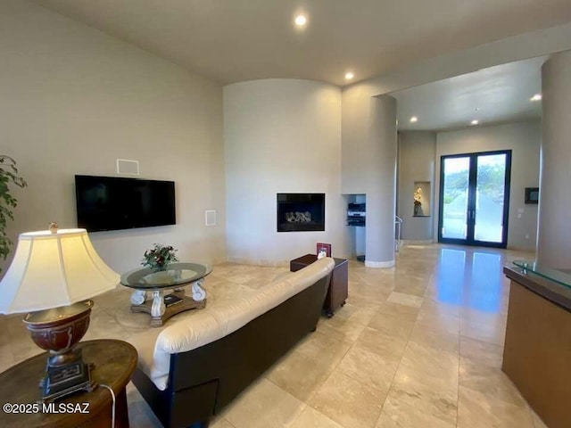 living room with recessed lighting and french doors