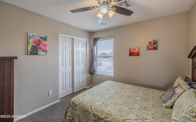 bedroom with a closet, carpet floors, baseboards, visible vents, and ceiling fan