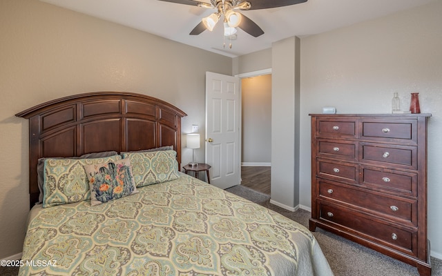 bedroom with baseboards, ceiling fan, and dark carpet