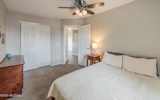 carpeted bedroom featuring baseboards, a closet, and ceiling fan