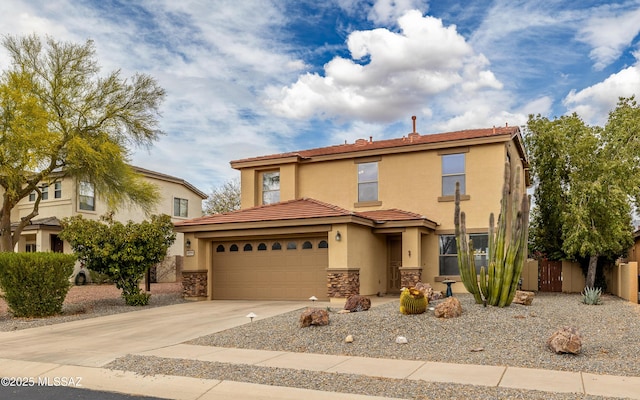 mediterranean / spanish house with stone siding, fence, an attached garage, stucco siding, and driveway
