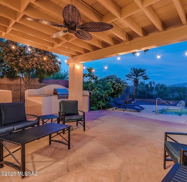 view of patio with a fenced backyard, an outdoor kitchen, a swimming pool, and a ceiling fan
