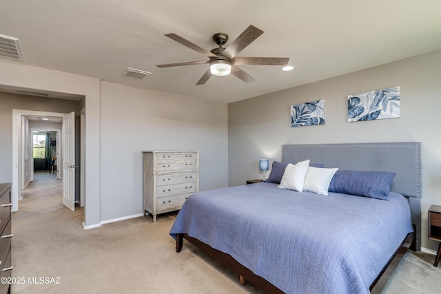 bedroom featuring a ceiling fan, baseboards, visible vents, and light carpet