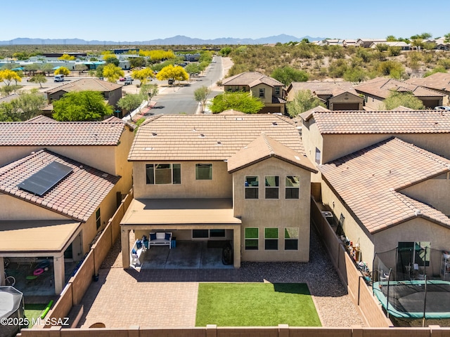 birds eye view of property featuring a residential view and a mountain view