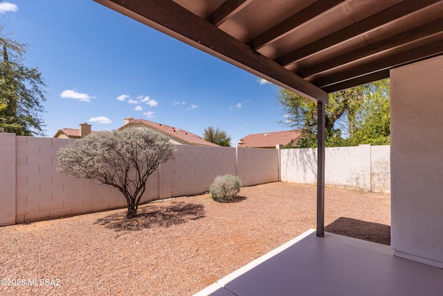 view of yard featuring a fenced backyard and a patio