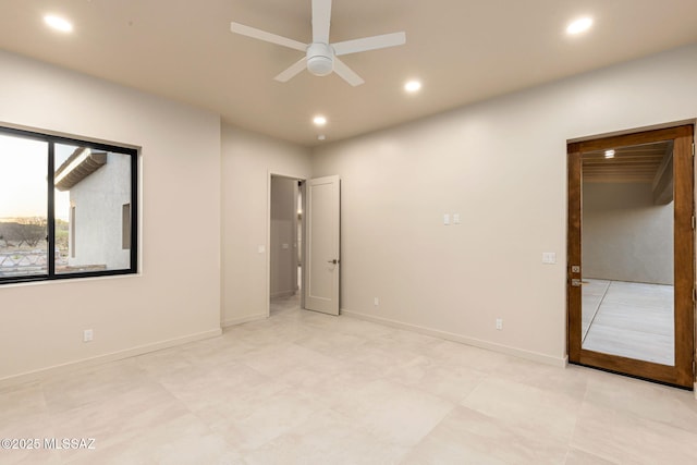 unfurnished bedroom with baseboards and recessed lighting