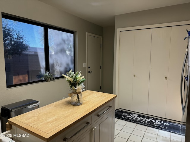 bathroom with tile patterned floors
