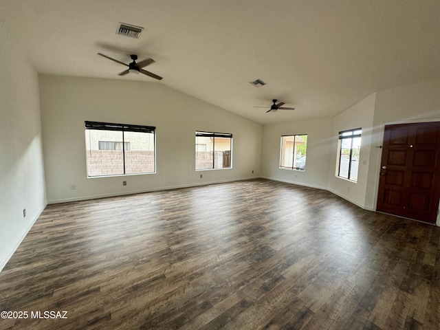 unfurnished living room with visible vents, ceiling fan, lofted ceiling, and dark wood-style floors
