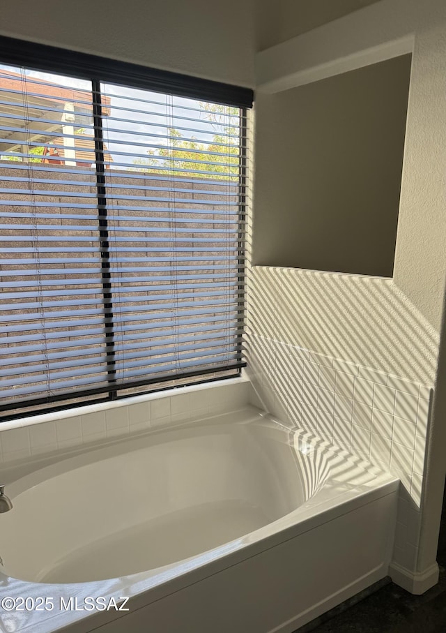 full bath featuring a garden tub