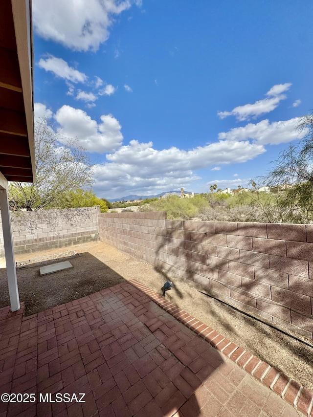 view of patio with a fenced backyard