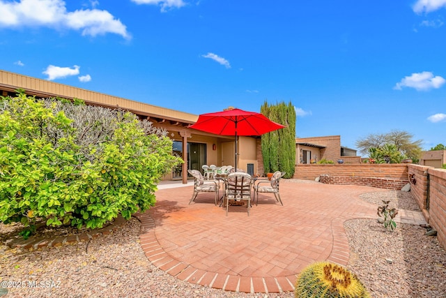 view of patio with fence