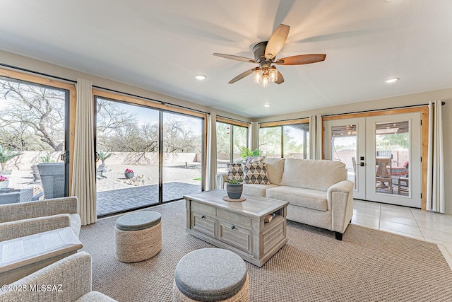 living room with plenty of natural light, ceiling fan, recessed lighting, and light tile patterned floors