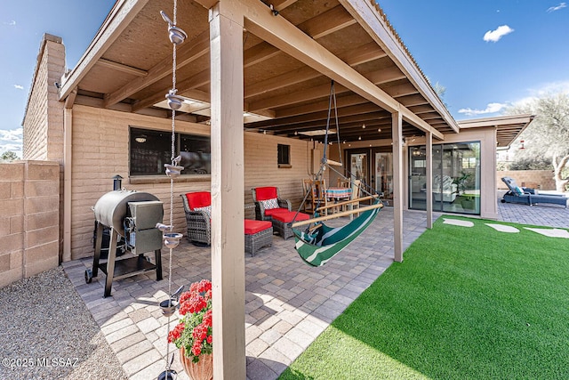 view of patio / terrace with fence