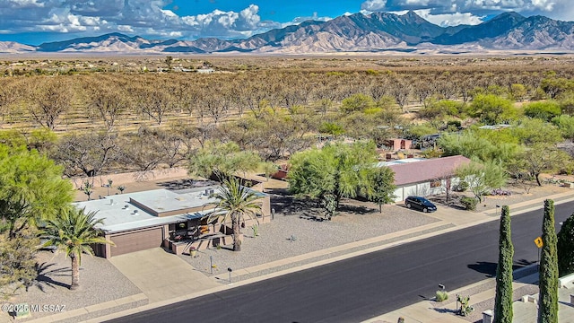 drone / aerial view featuring a mountain view