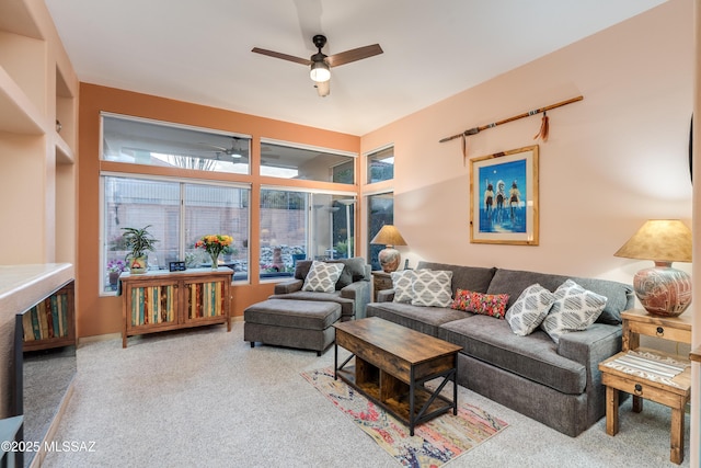 living room with a ceiling fan