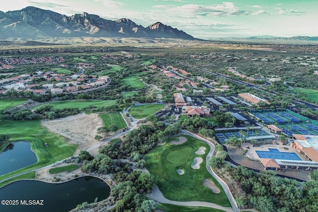 birds eye view of property featuring a water and mountain view