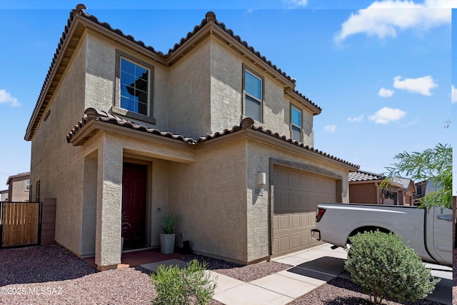 22082 E Thunderhead Dr, Red Rock, AZ 85145 - mediterranean / spanish-style home featuring an attached garage, fence, a tile roof, and stucco siding