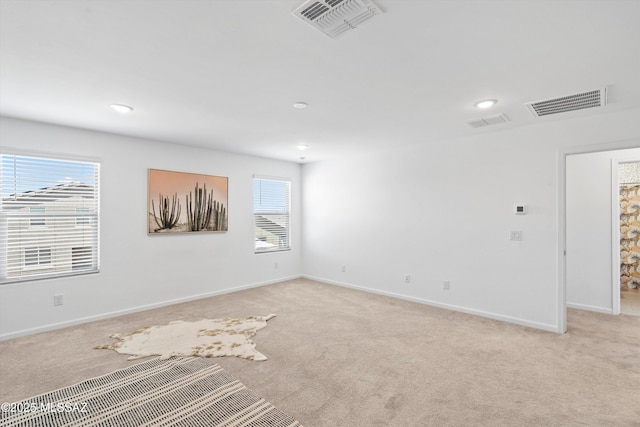 22082 E Thunderhead Dr, Red Rock, AZ 85145 - unfurnished room featuring light carpet and visible vents