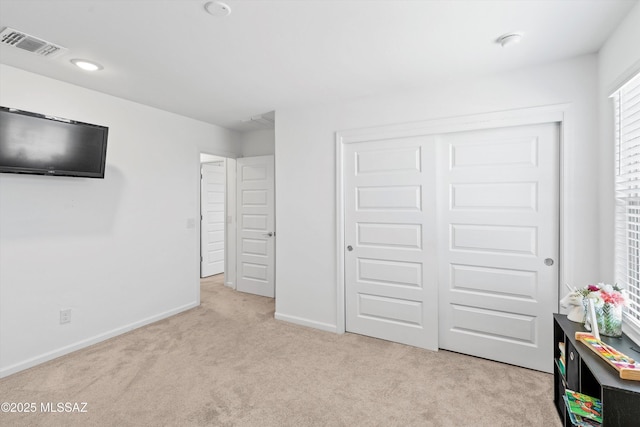 22082 E Thunderhead Dr, Red Rock, AZ 85145 - carpeted bedroom featuring baseboards, visible vents, and a closet