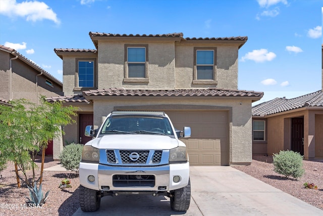 22082 E Thunderhead Dr, Red Rock, AZ 85145 - mediterranean / spanish-style house with a tiled roof, a garage, stucco siding, and driveway