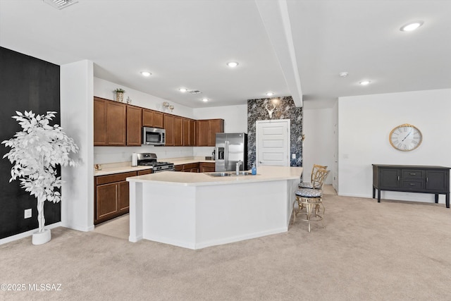 22082 E Thunderhead Dr, Red Rock, AZ 85145 - kitchen with light countertops, appliances with stainless steel finishes, and light colored carpet