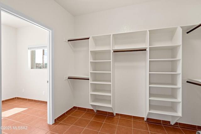 walk in closet featuring tile patterned floors