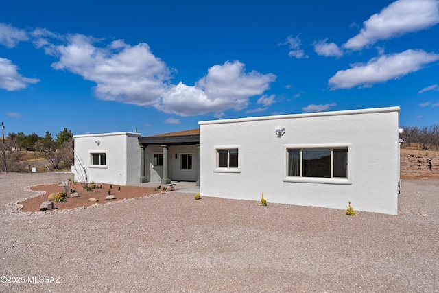 view of front of property featuring stucco siding