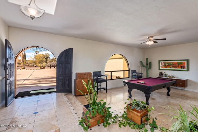 recreation room with baseboards, billiards, a healthy amount of sunlight, and tile patterned flooring