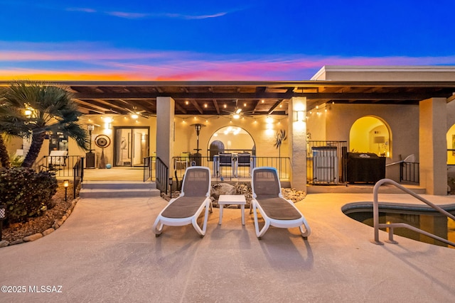 patio terrace at dusk with fence