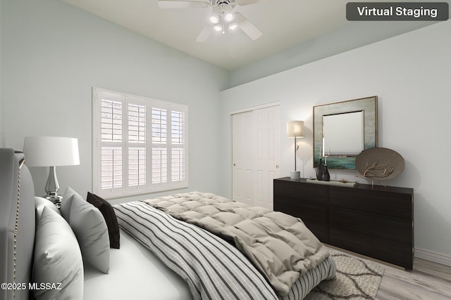 bedroom with a closet, ceiling fan, and wood finished floors