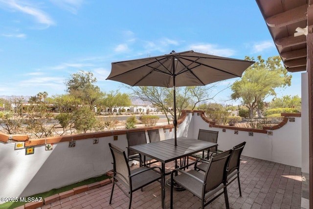 view of patio with outdoor dining area