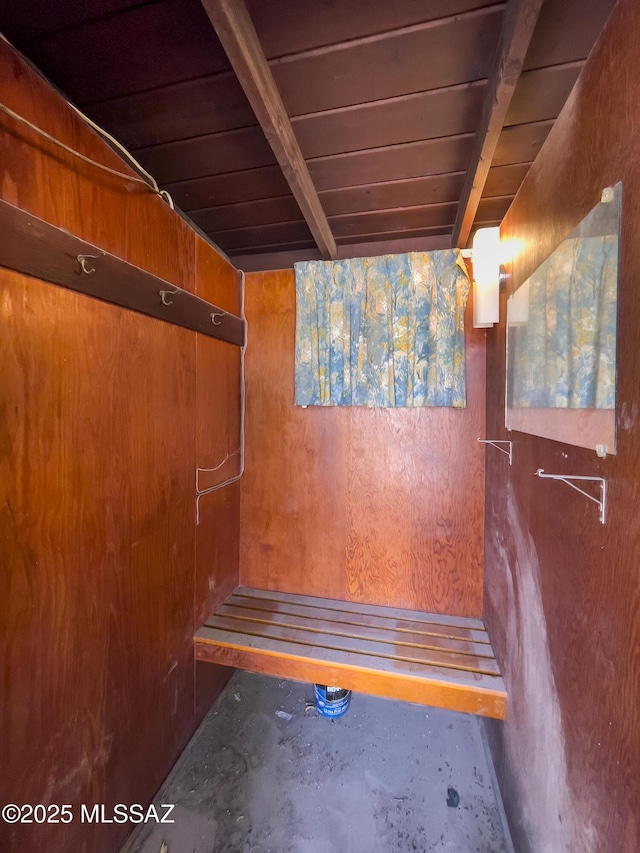 3256 E Terra Alta Blvd, Tucson, AZ 85716 - detailed view of unfinished concrete flooring, wooden ceiling, wood walls, and beamed ceiling