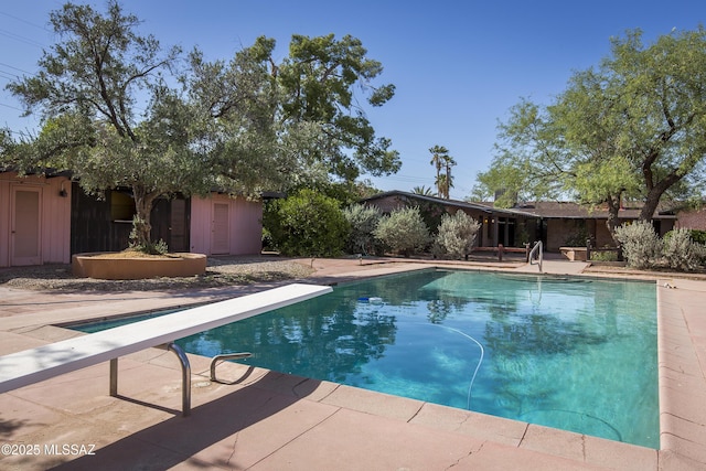 3256 E Terra Alta Blvd, Tucson, AZ 85716 - view of pool featuring a diving board, an outbuilding, and a patio
