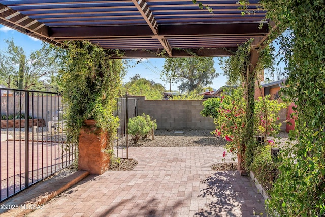 view of patio featuring a pergola and fence private yard