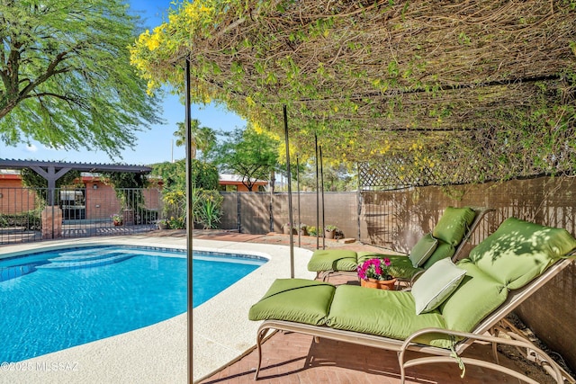 view of pool with a fenced backyard, a fenced in pool, and a patio