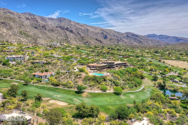 aerial view featuring a water and mountain view and golf course view