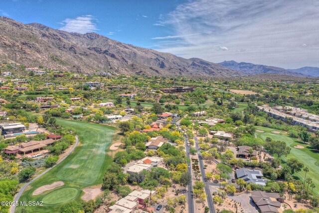 birds eye view of property with a residential view, a mountain view, and golf course view