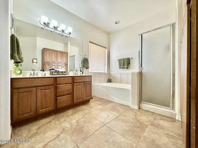 full bathroom with a bath, a sink, tile patterned flooring, and a stall shower