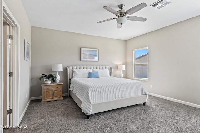 bedroom with dark colored carpet, visible vents, baseboards, and ceiling fan