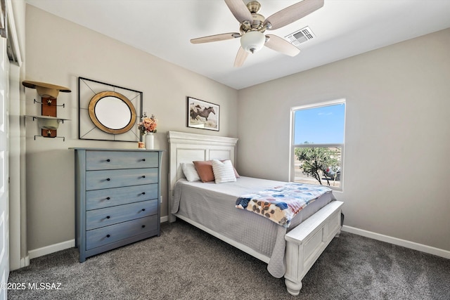 bedroom with carpet floors, visible vents, a ceiling fan, and baseboards