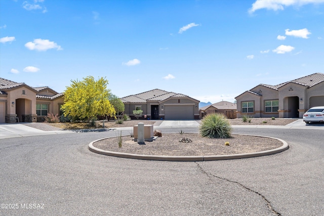 1073 Whispering Meadows Ct, Sahuarita, AZ 85629 - mediterranean / spanish house featuring stucco siding, a tile roof, and a residential view