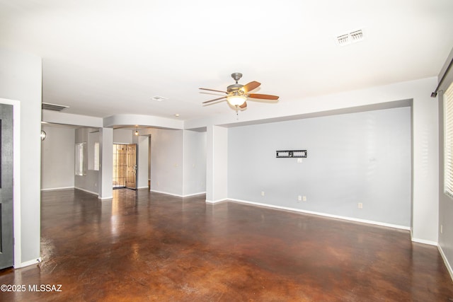 1419 W Red Creek Dr, Tucson, AZ 85737 - unfurnished living room with concrete floors and ceiling fan