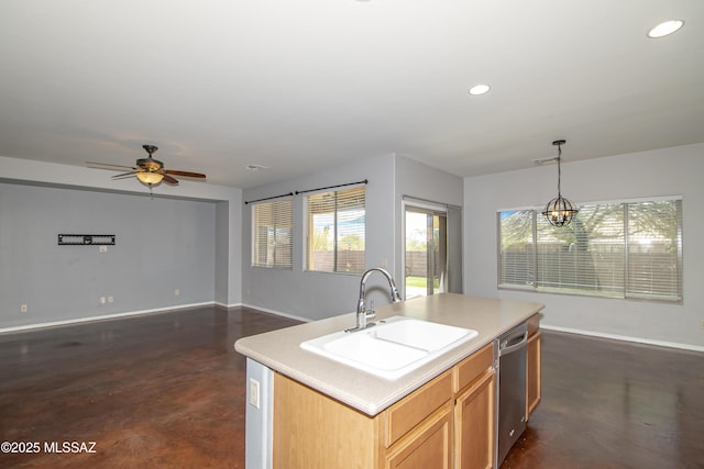 1419 W Red Creek Dr, Tucson, AZ 85737 - kitchen featuring dishwasher, finished concrete flooring, a kitchen island with sink, a ceiling fan, and hanging light fixtures