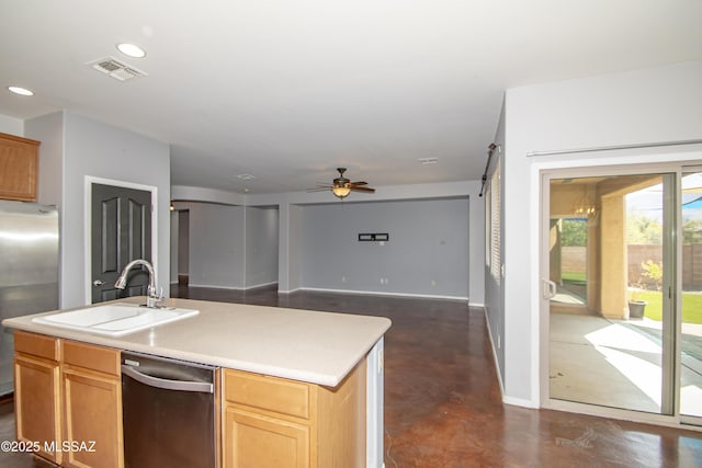 1419 W Red Creek Dr, Tucson, AZ 85737 - kitchen with stainless steel appliances, finished concrete floors, a ceiling fan, light countertops, and a center island with sink