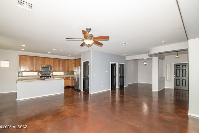 1419 W Red Creek Dr, Tucson, AZ 85737 - unfurnished living room with finished concrete flooring, recessed lighting, and ceiling fan