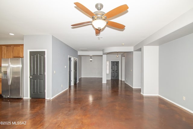 1419 W Red Creek Dr, Tucson, AZ 85737 - unfurnished living room with concrete floors, ceiling fan, and recessed lighting