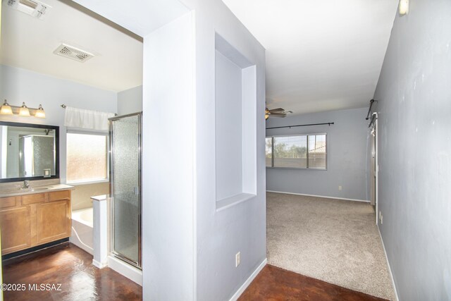 1419 W Red Creek Dr, Tucson, AZ 85737 - bathroom featuring vanity, a garden tub, a stall shower, and a ceiling fan