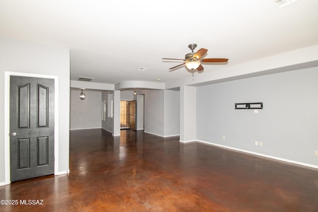 1419 W Red Creek Dr, Tucson, AZ 85737 - unfurnished living room featuring concrete flooring and a ceiling fan